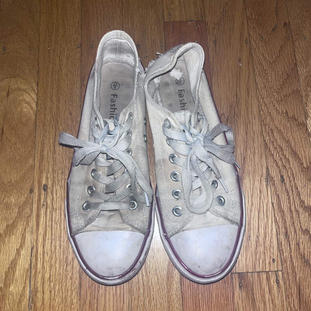 Extremely Worn Low Top Sneakers